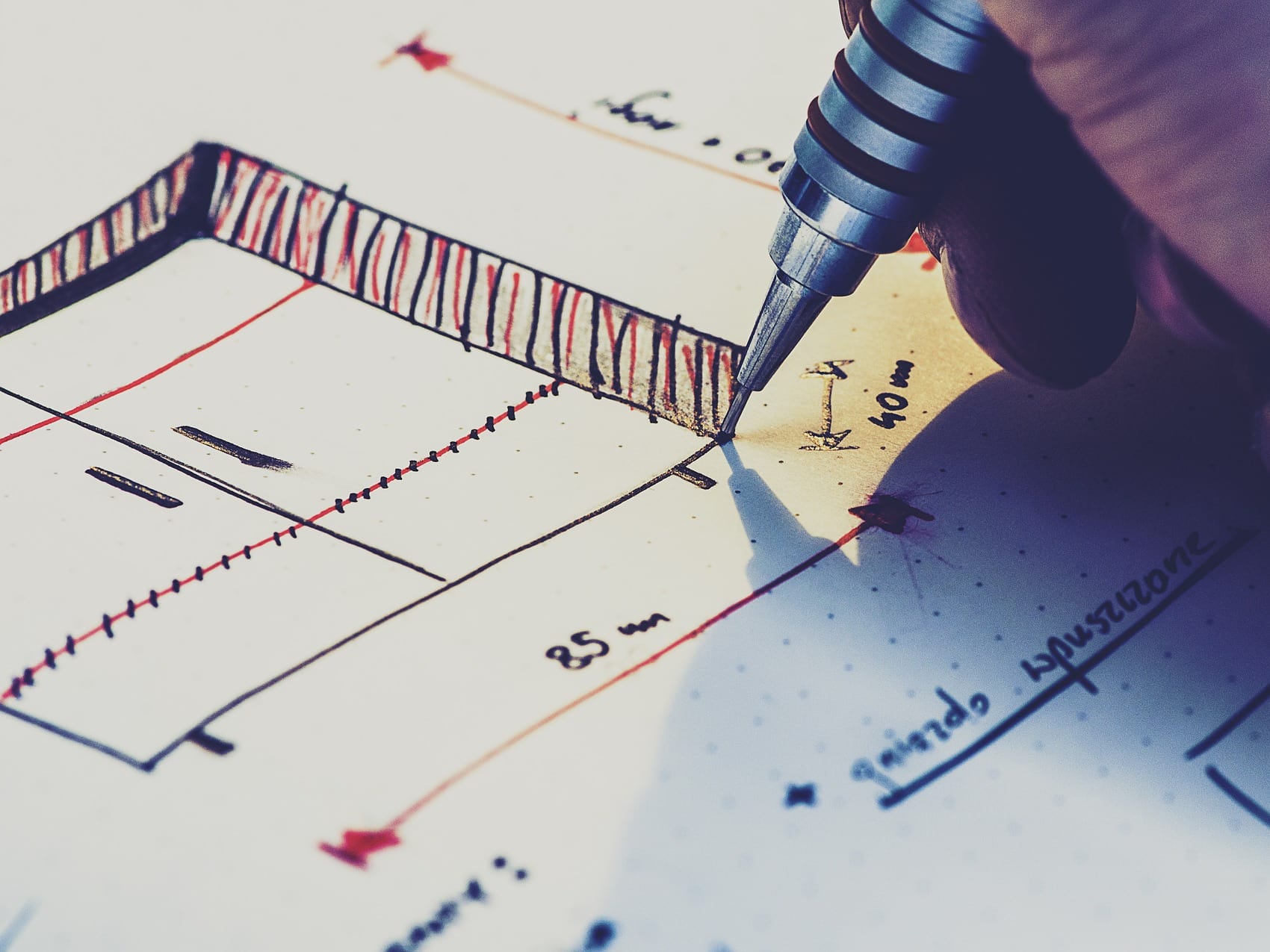 Hand drawing a plan for a cabinet